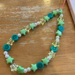 phone charm package (case not for sale and package comes with 2 phone charms)